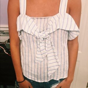 White and light blue striped top